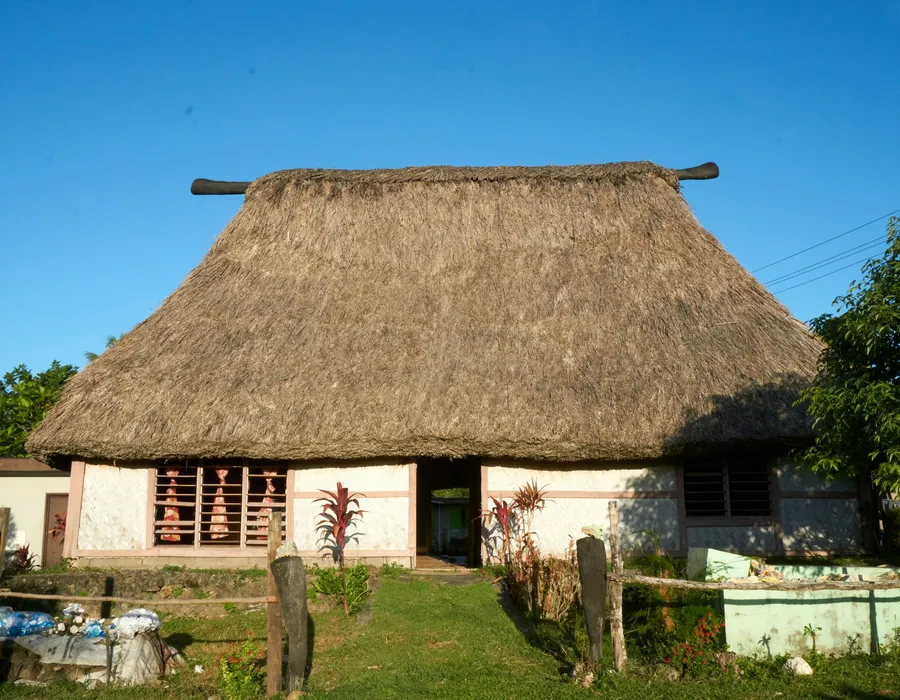 Traditional Fijian bure with a thatched roof in Sanasana Village on the Coral Coast